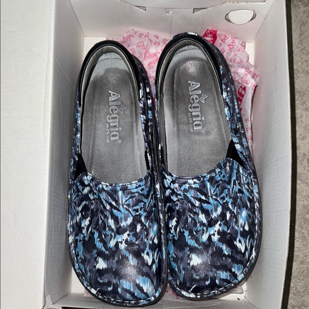 Alegria Women’s Black and Blue Patterned Slip ons. Lightly worn, good condition